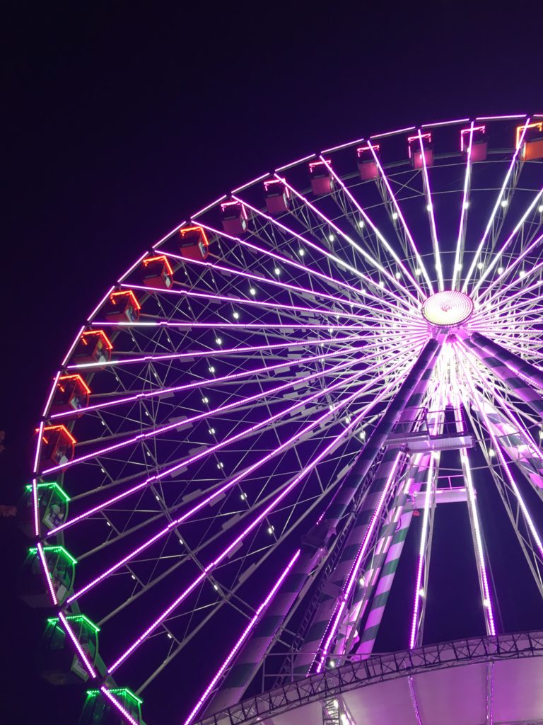 Bright Ferris wheel at night